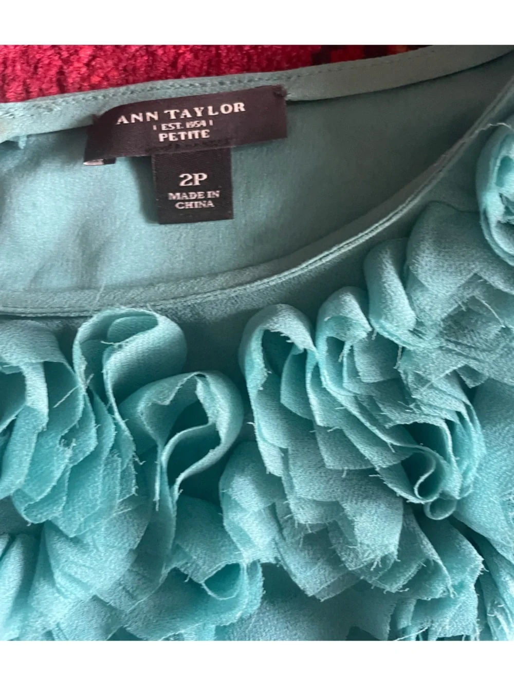 Ann Taylor turquoise blouse with flower ruffles